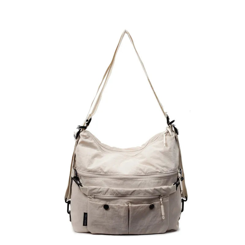 Women's nylon crossbody bag with adjustable strap and external pocket in khaki colour