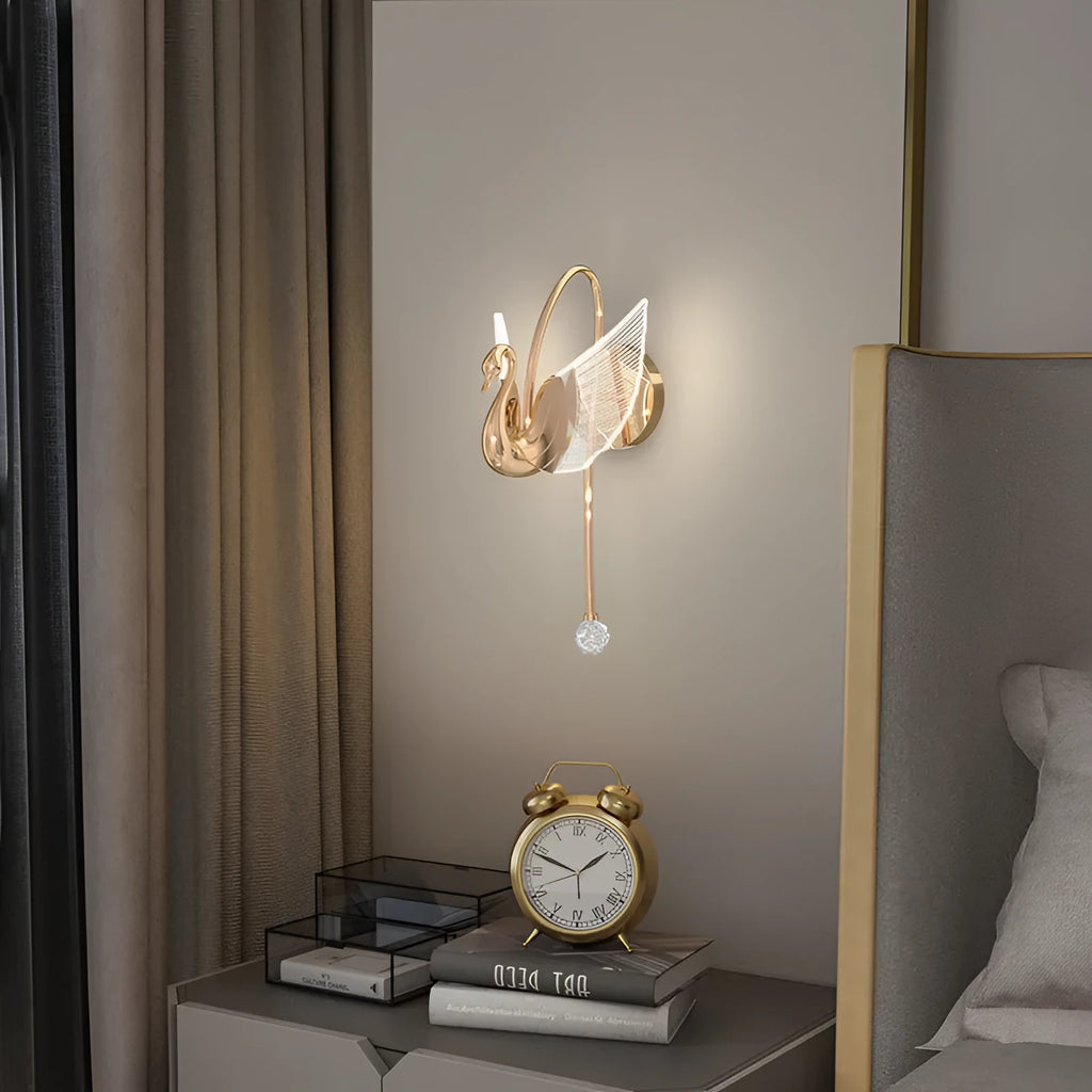 Modern minimalist gold swan wall lamp with acrylic shade showing tricolour LED light options for bedroom bedside use