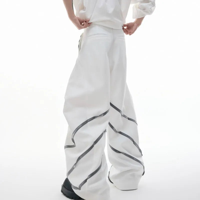 Men's polyester trousers with three-dimensional cutting and metal striped rivet pleats in black or white colours