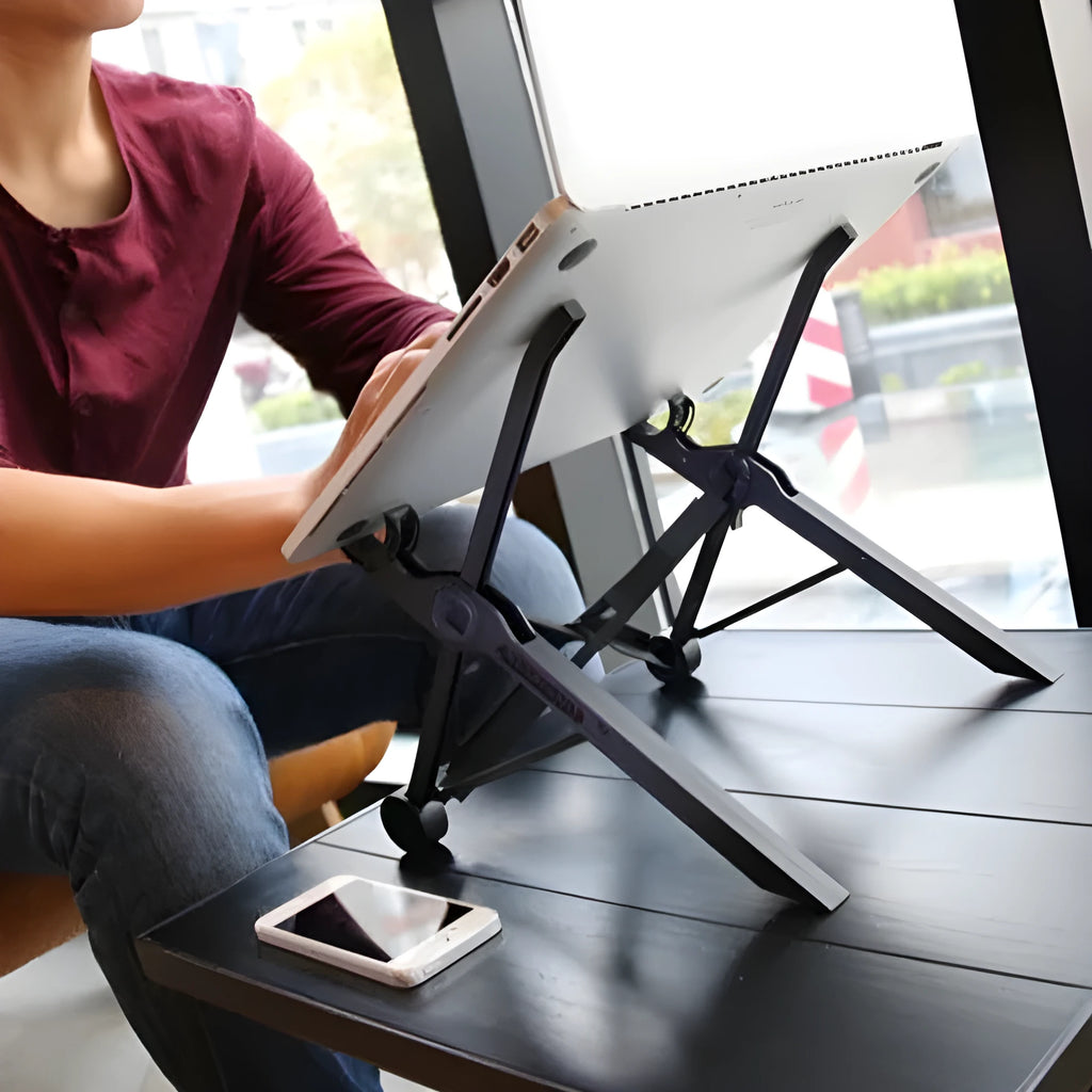 Sagacious black portable folding laptop bracket showing lifting mechanism and folded position