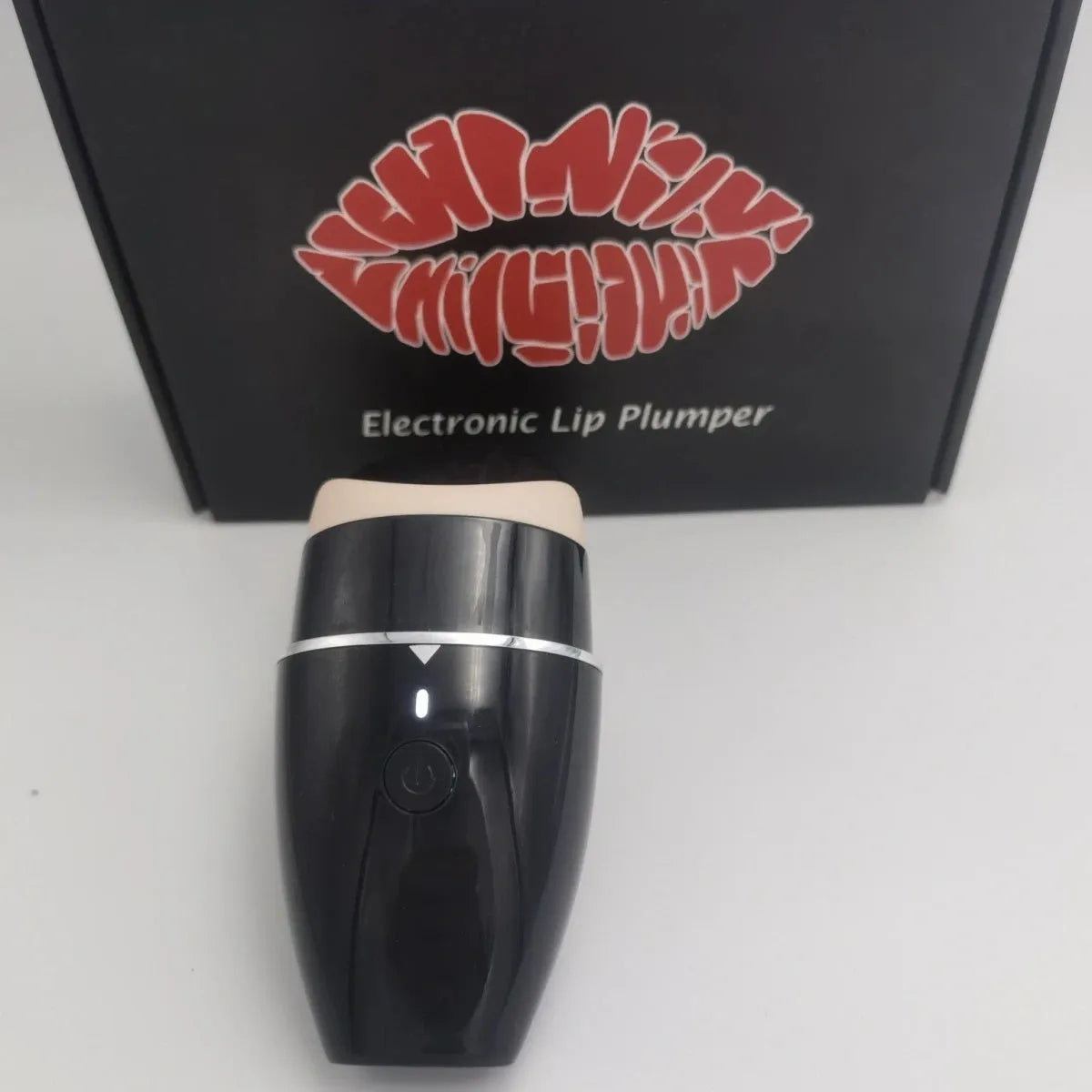 Black electric silicone lip plumper with 3-speed adjustment buttons and USB charging port