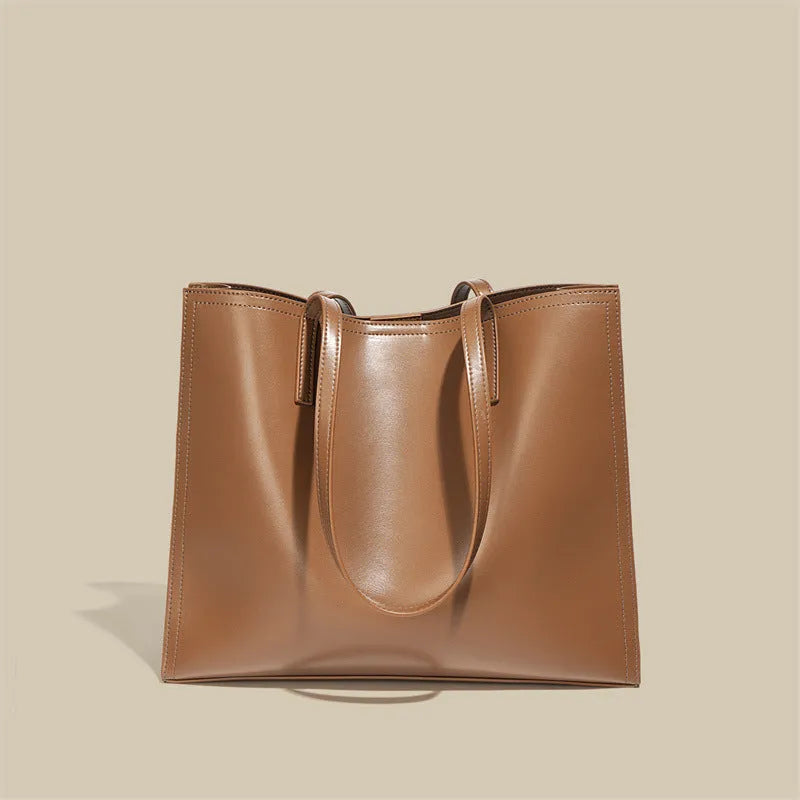 Brown genuine leather women's one shoulder handbag with a horizontal square shape.