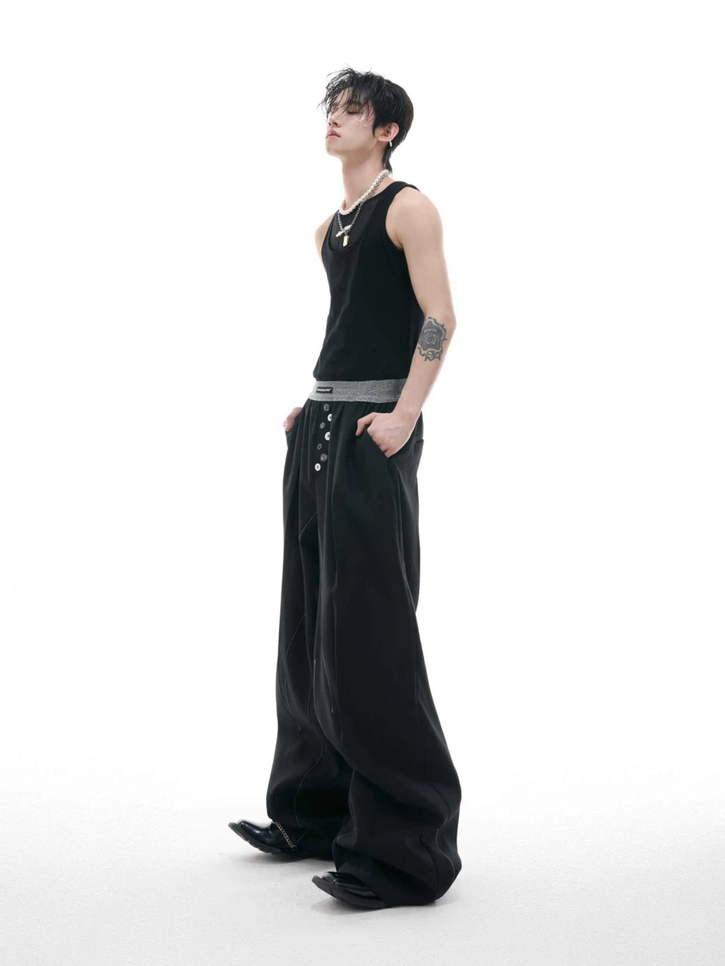 Straight-leg high-waisted casual trousers with button open line detail in black and grey colours