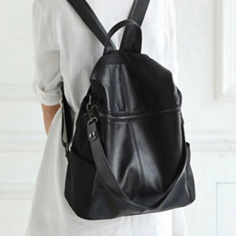 Genuine leather women's retro backpack showing multiple compartments and European-American styling