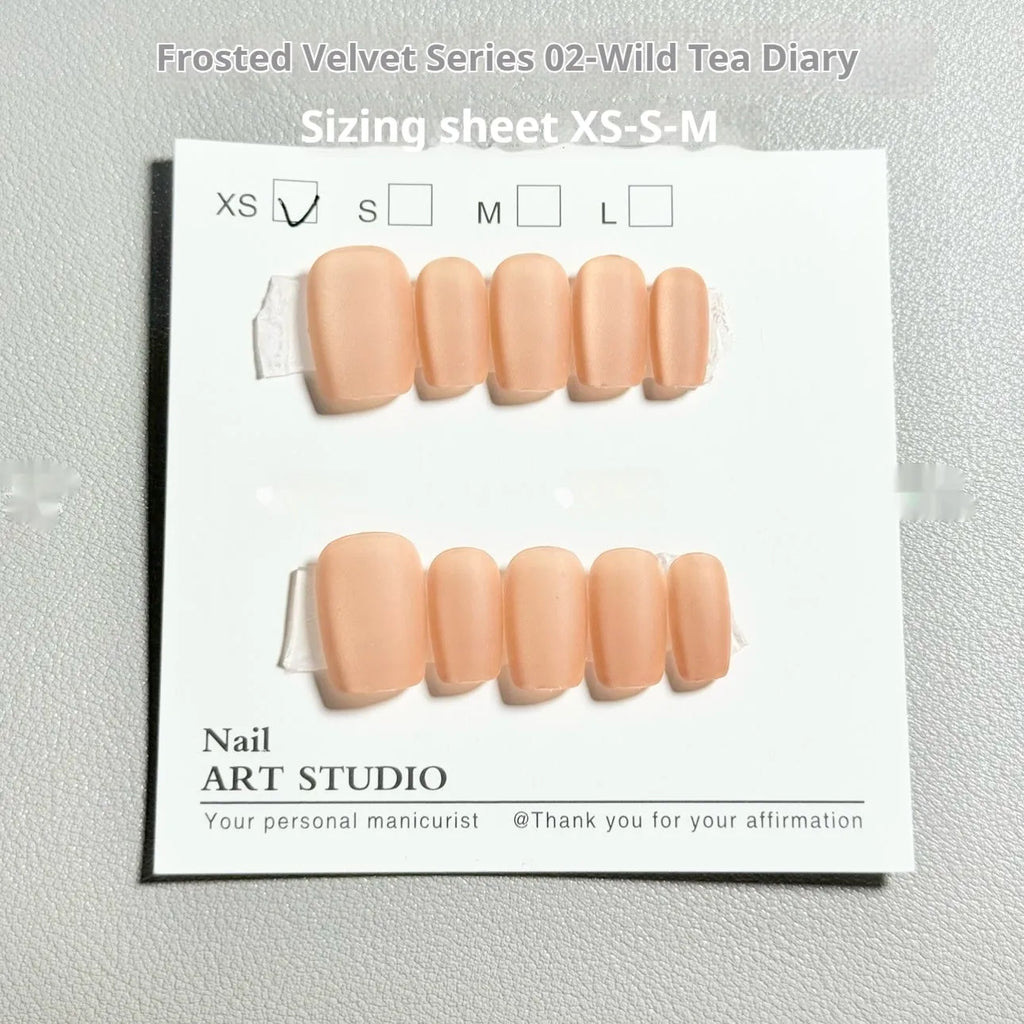 Velvet frosted Cat's Eye artificial nails in short ladder sizes XS, S, and M with Aurora armour styling