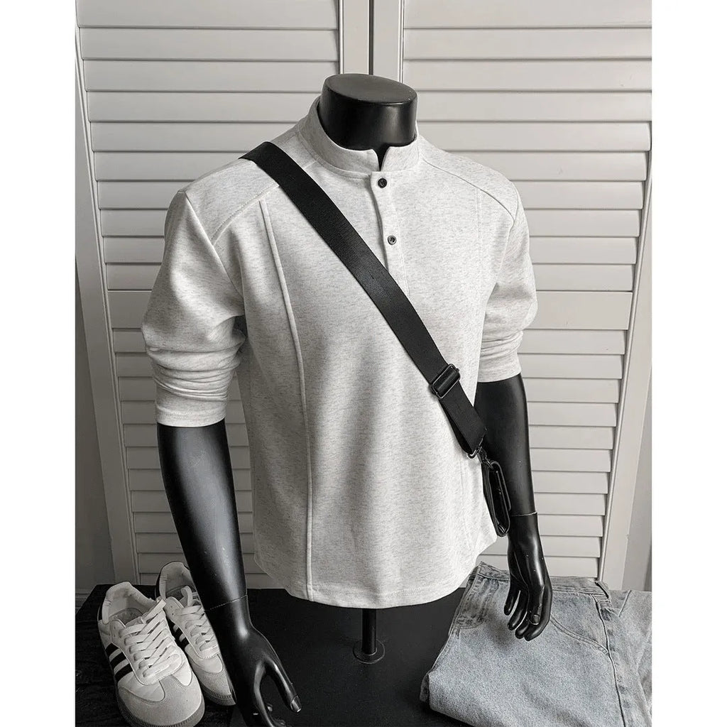 Men's loose fit asymmetric patchwork stand-up collar long sleeve shirt in grey.