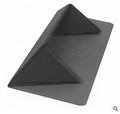 Blue foldable laptop cooling bracket with anti-slip surface shown open next to a closed laptop