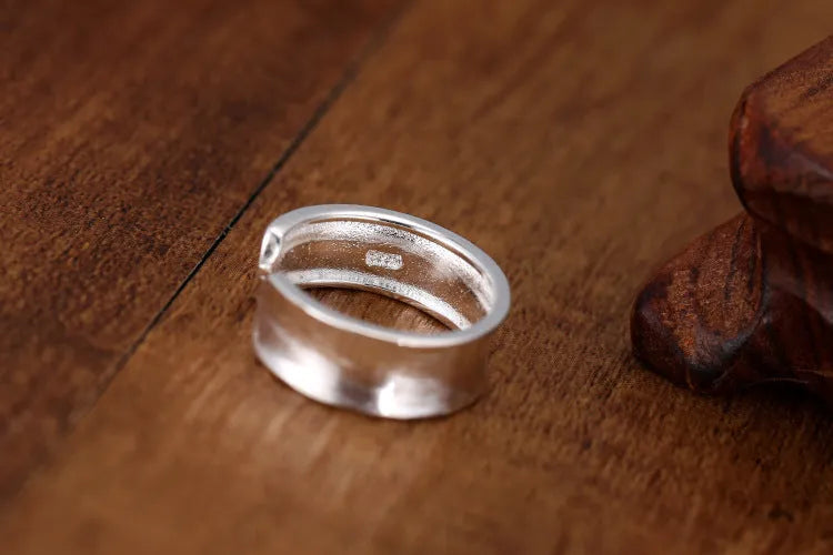Adjustable open ring with geometric design and frosted sterling silver finish