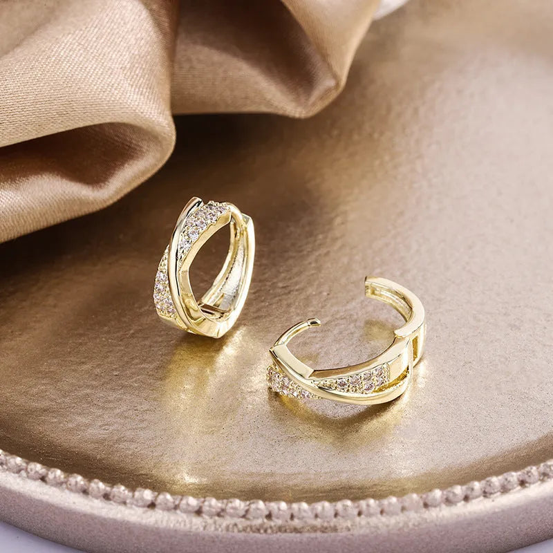 Geometric copper earrings with 14K yellow zircon stone accents showing simple wild aesthetic design