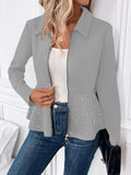 Women's solid-colour beaded coat with a ruffled hem and heavy-duty zipper in a loose fit.