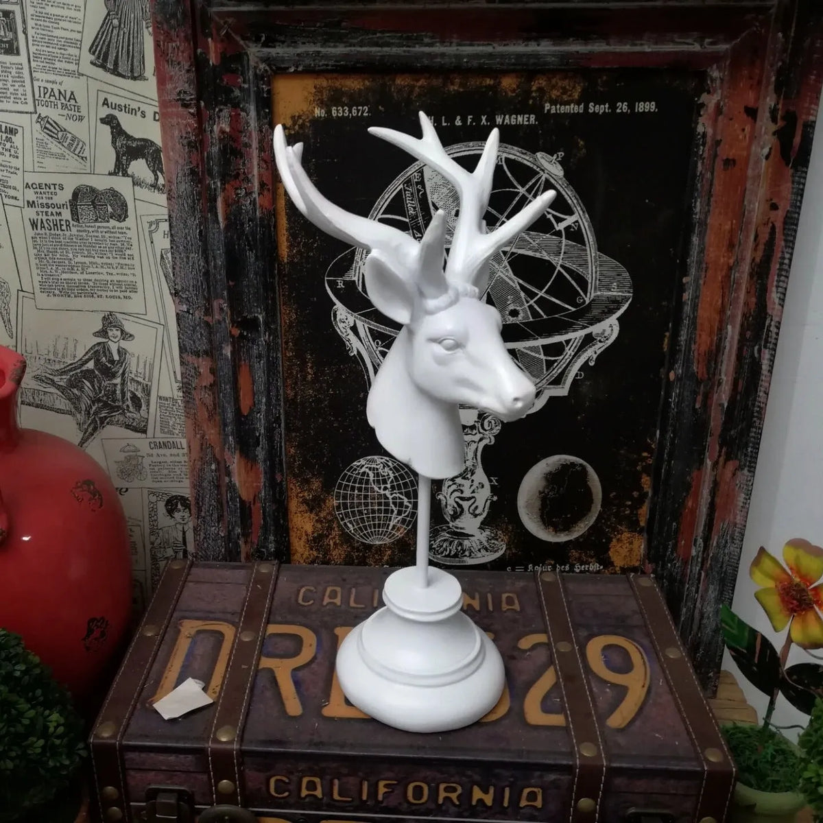 A black, white, or wood-coloured animal model sculpture made from natural resin for home decoration.