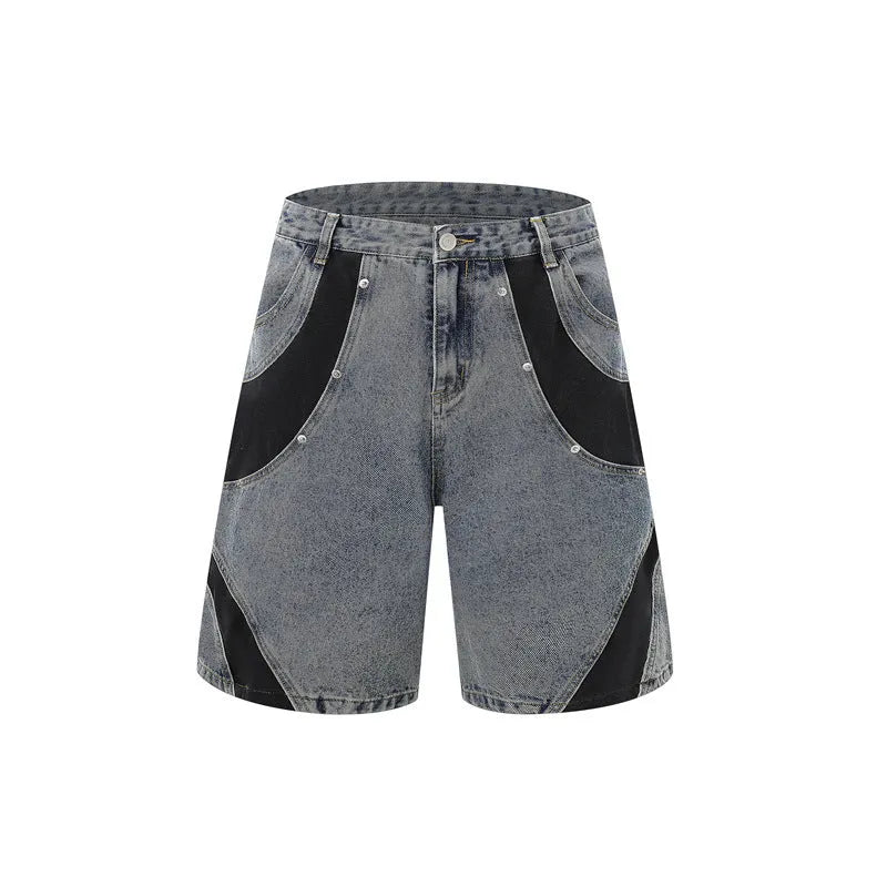 Retro washed blue denim suit set featuring a short-sleeved jacket and matching trousers on a rack.