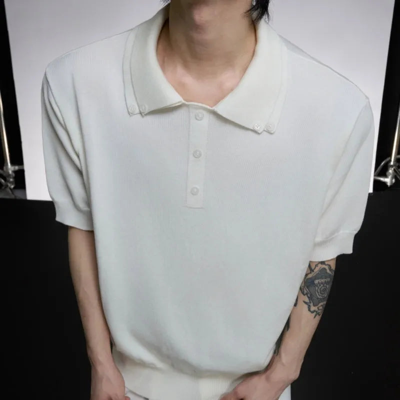 Men's grey short sleeve knit shirt featuring a double collar design with fasteners, shown in a loose fit.