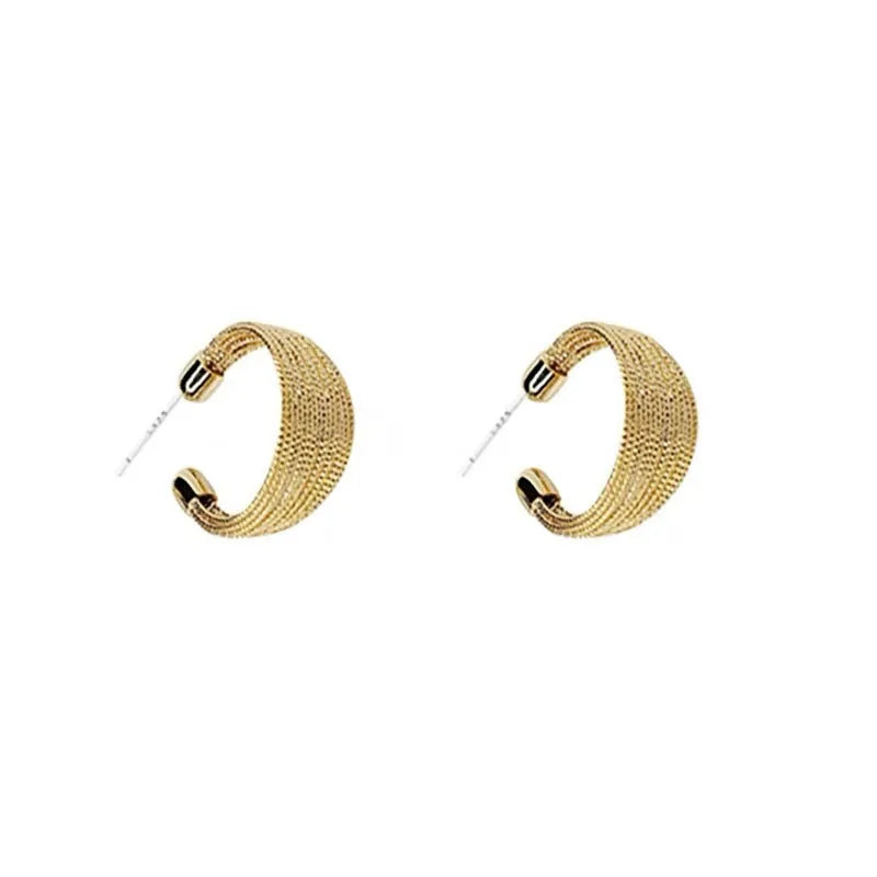 Geometric copper earrings with electroplated silver or gold finish, shown as stud and clip-on styles