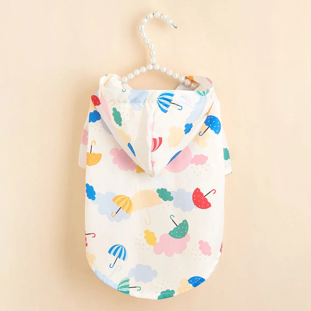 Colourful cartoon umbrella pattern dog or cat raincoat in polyester fabric.