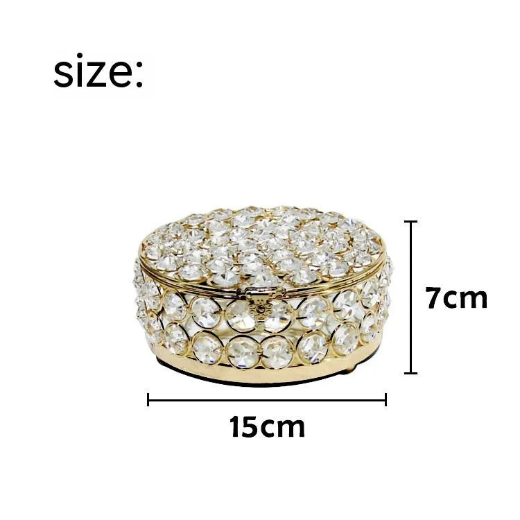 French gold European style jewelry box with crystal glass transparent lid showing contents