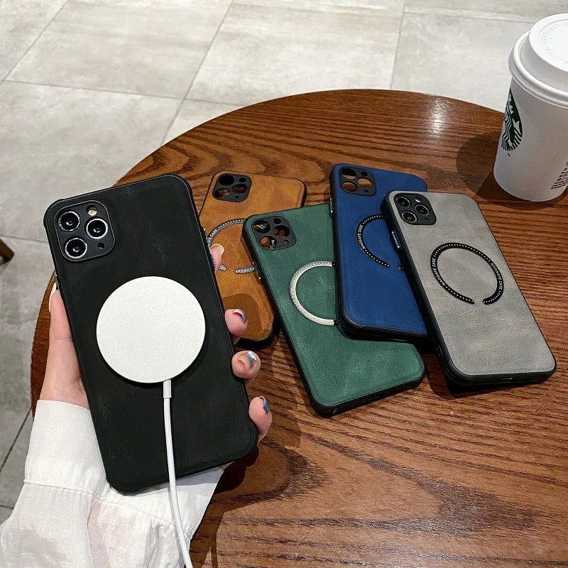 Black imitation leather magnetic charging case for Apple iPhone on a table.