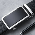 Men's gun black leather belt with a silver automatic alloy buckle, shown alongside silver and gold colour options.