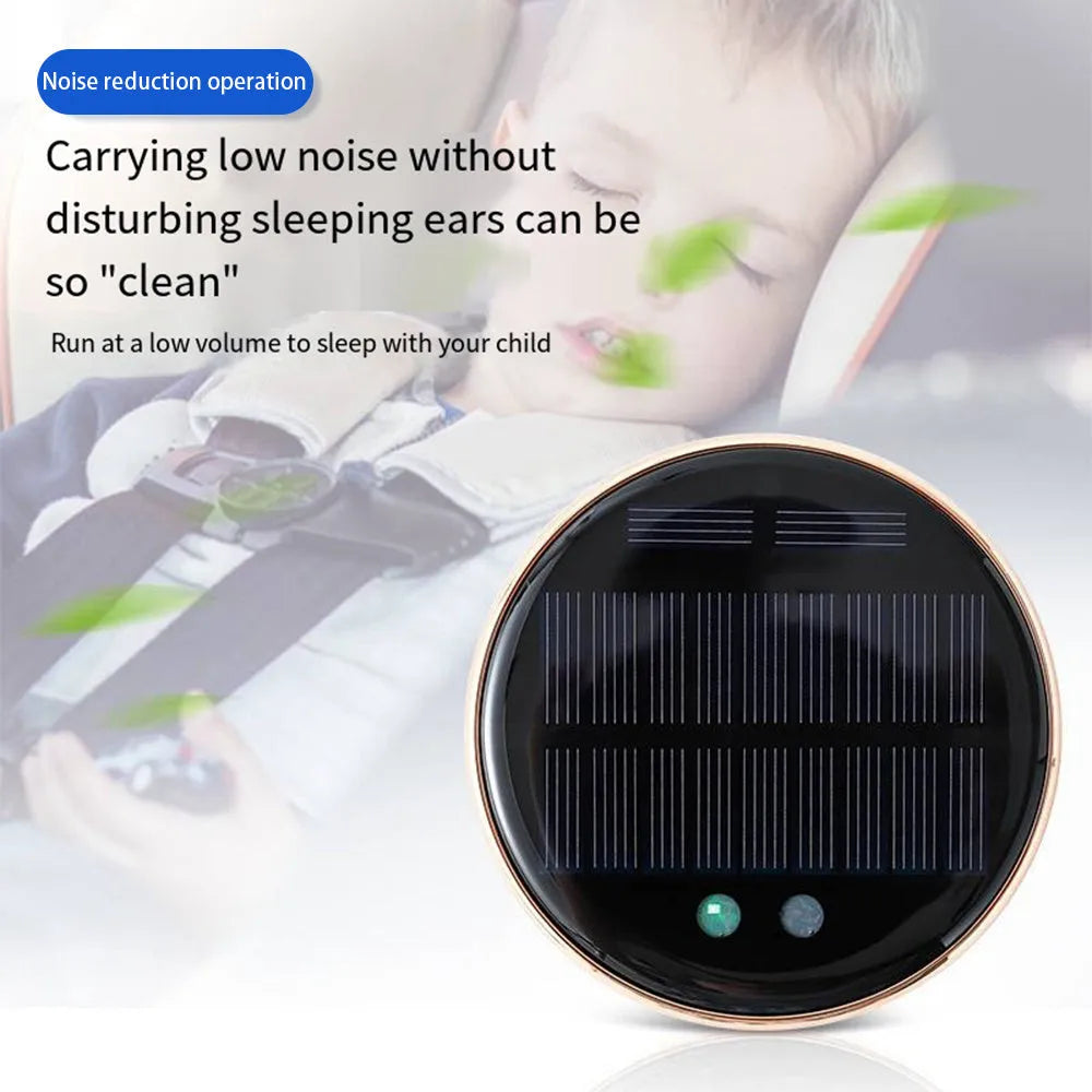 Black solar-powered car air humidifier mounted on a vehicle air vent.