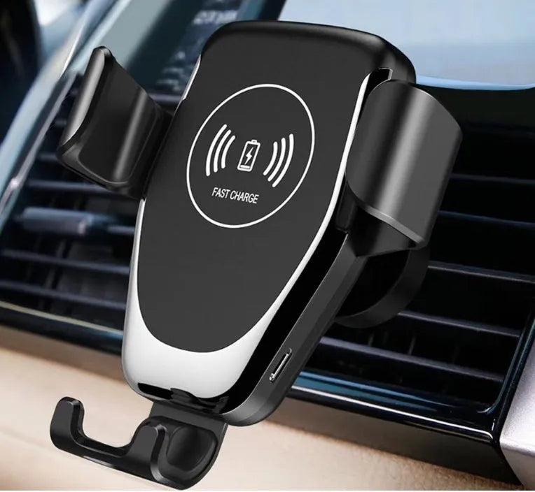 Black car wireless charger mounted on vent automatically clamping iPhone with 18W fast charging