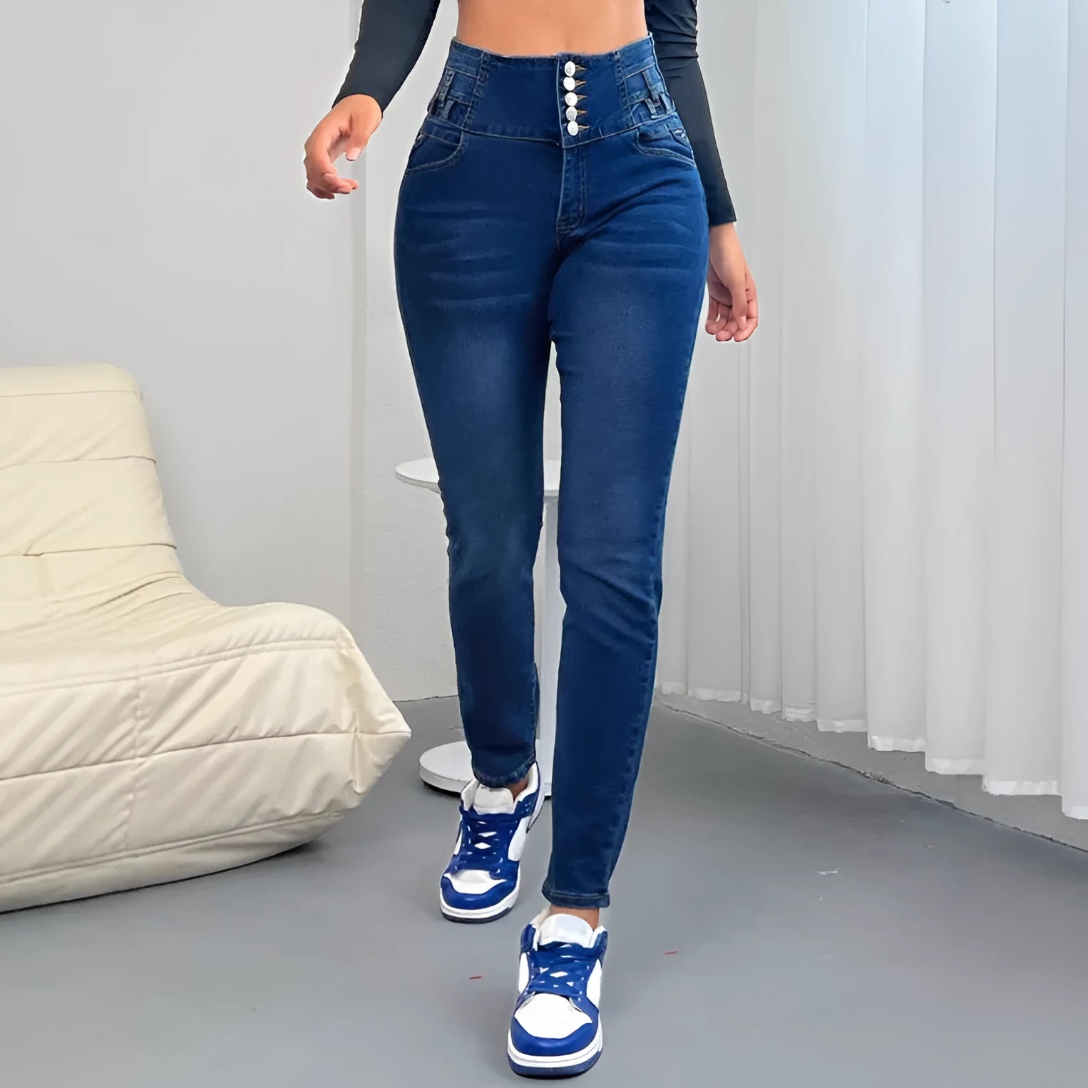 Women's dark blue straight-leg denim trousers with breasted styling and button details