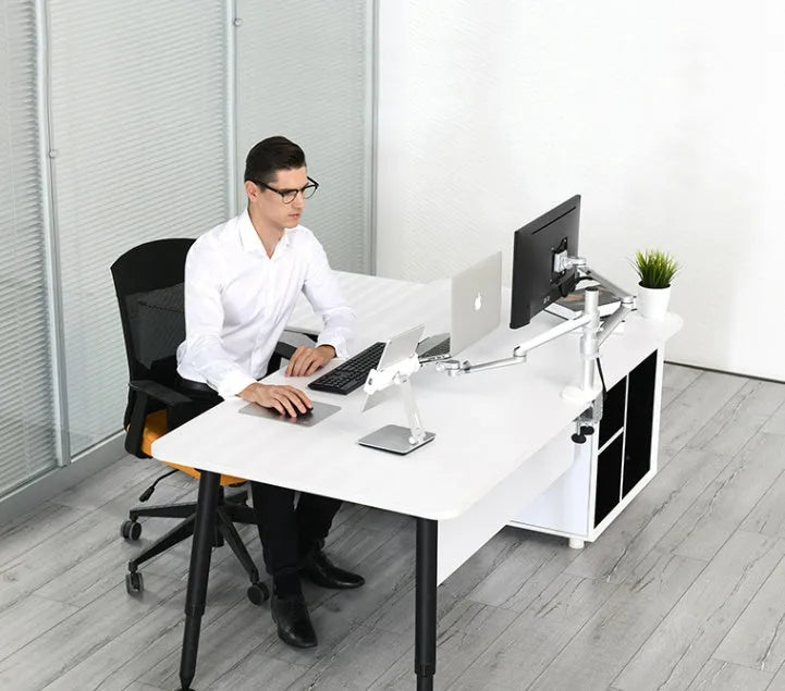 Silver aluminium folding phone and tablet stand on a desk, holding a tablet