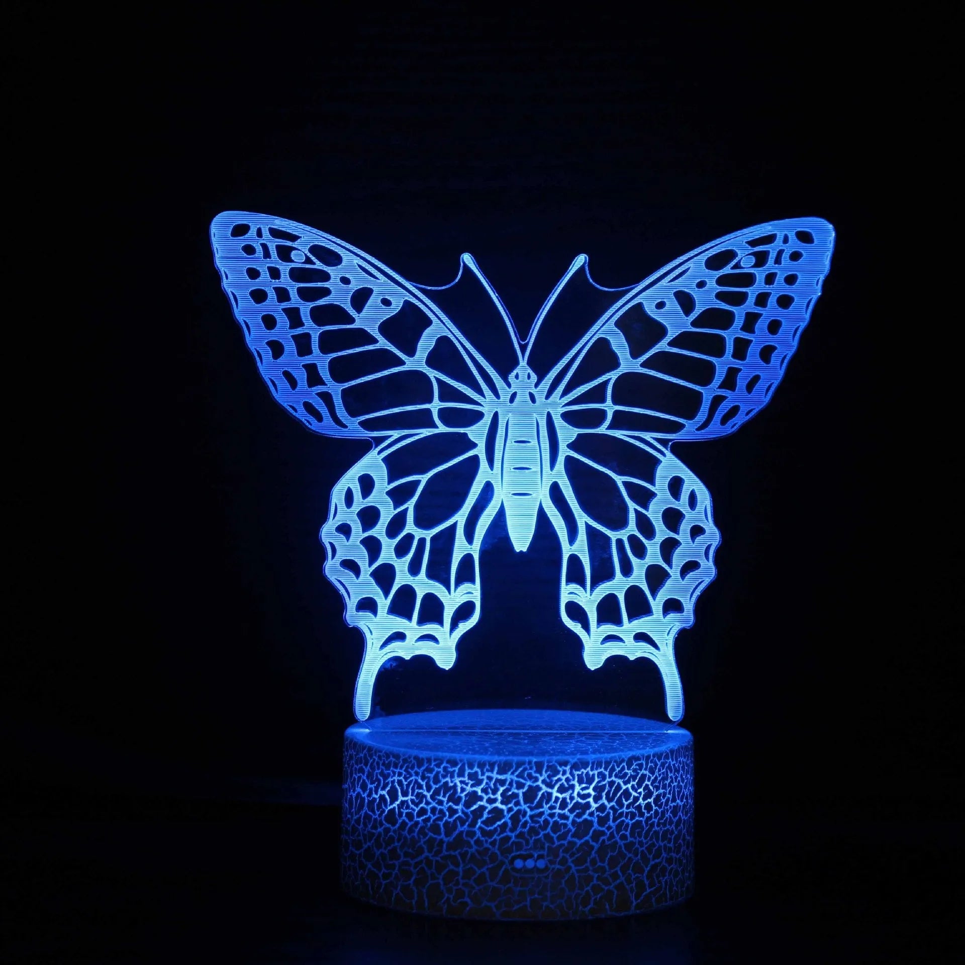 Colourful acrylic 3D USB table lamp with touch control on a small black ABS base.