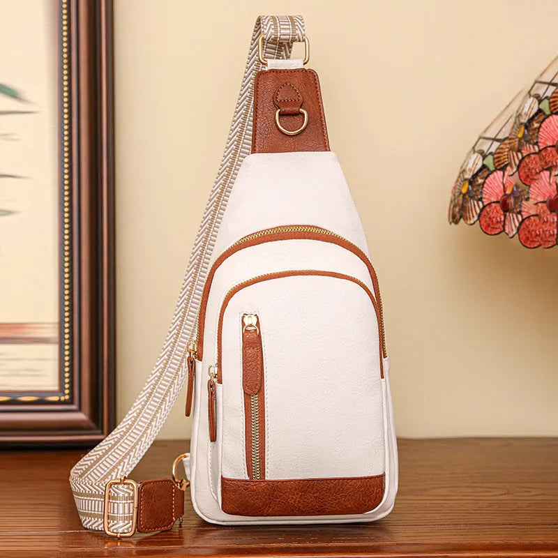 Women's soft PU leather crossbody messenger bag in street trend style with sewing thread details.