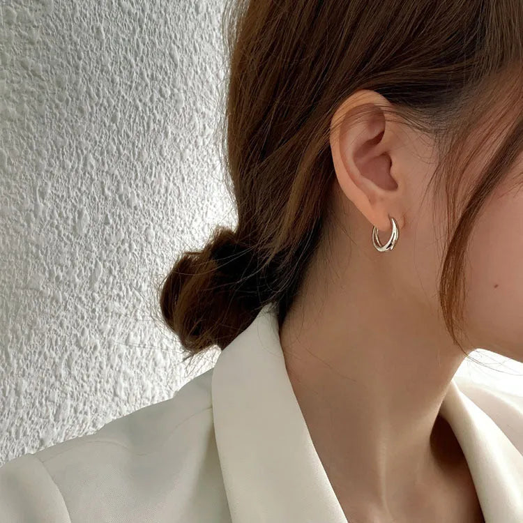 Women's geometric water drop earrings with copper construction and electroplated gold or silver finish