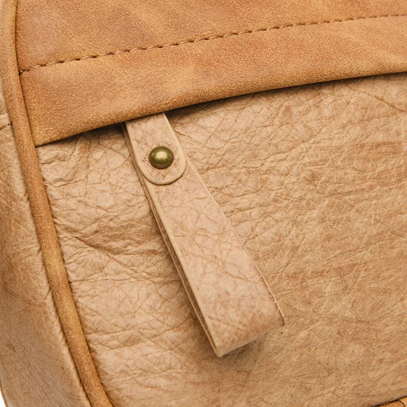 Men's paper crossbody bag in retro style with waterproof coating in black, brown, or silver colours