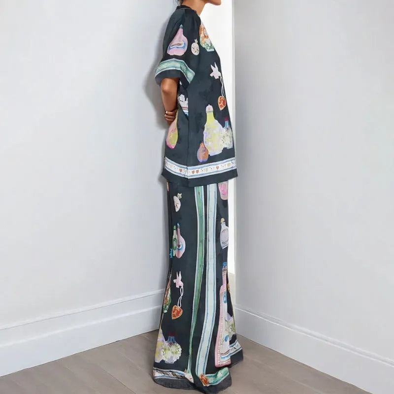 Black women's cardigan and trouser set with cartoon animation pattern