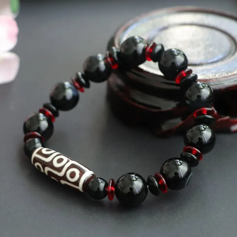 Black agate dzi bead bracelet with geometric 11mm chalcedony beads