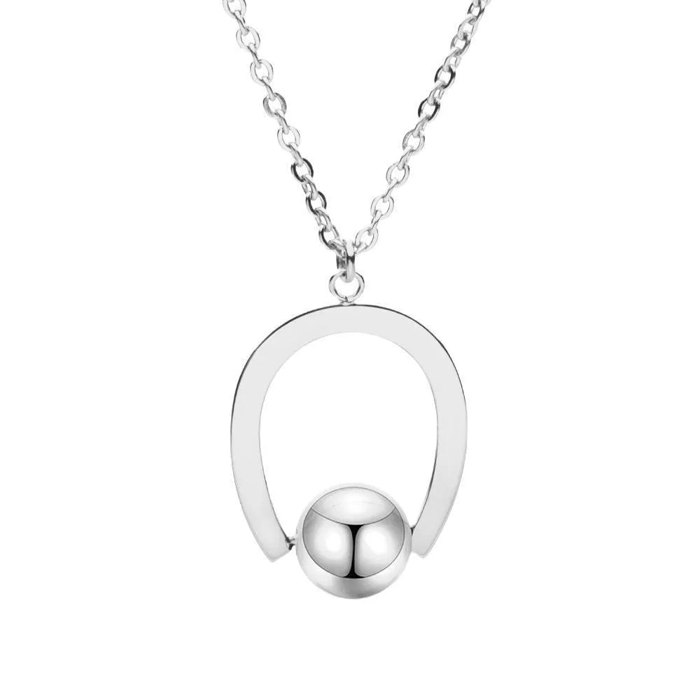 Adjustable stainless steel necklace with a geometric pendant on a cross chain in gold or silver.