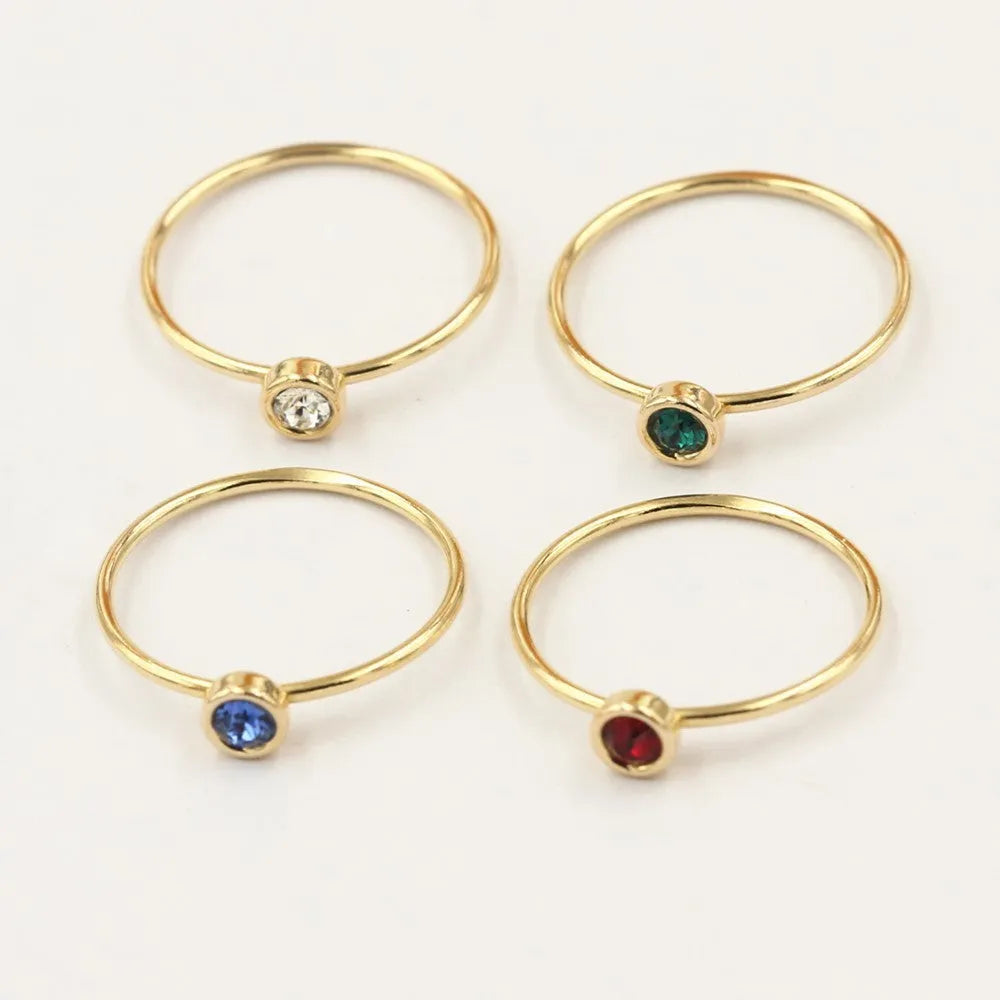 14K gilded women's knuckle ring with cubic zirconia stone in green, blue, dark red or white colours