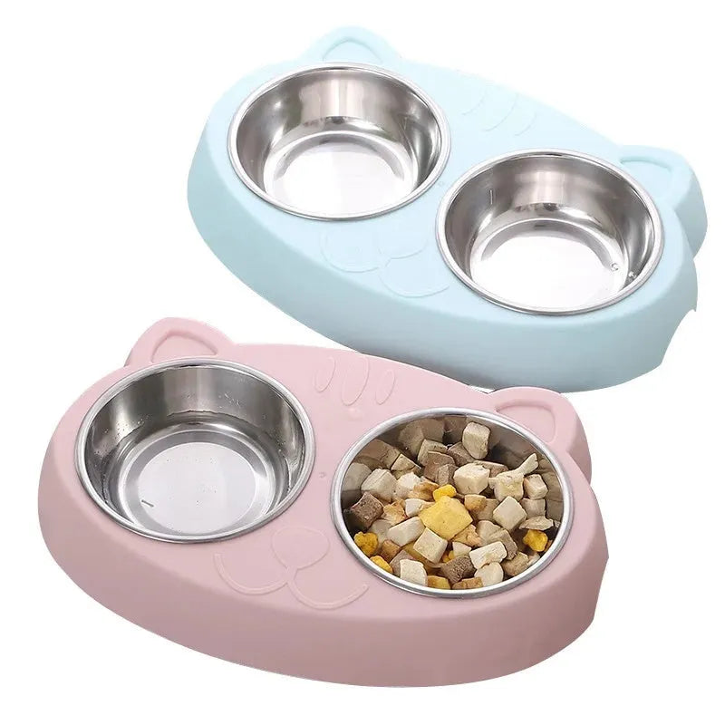 Blue macaron-shaped plastic pet feeder tray with two bowls for cat or small dog food and water.