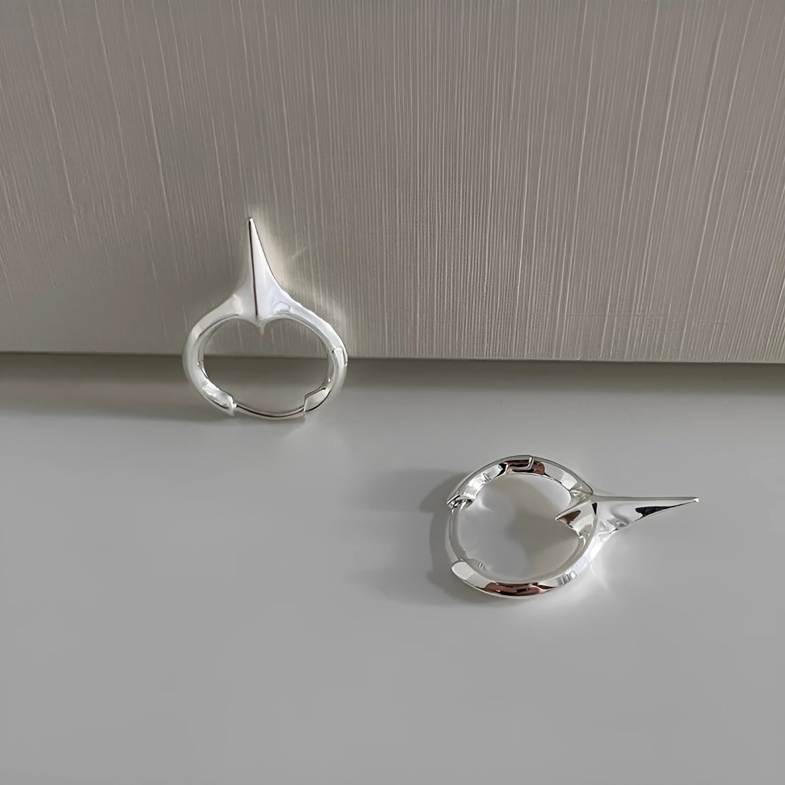 Geometric star ear clip for women in platinum colour with copper construction and electroplated finish
