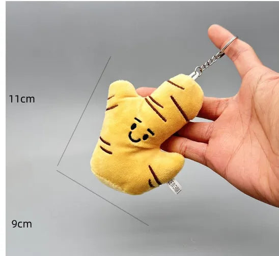 Funny vegetable plush keychain featuring onion, garlic, and broccoli pendants on a ring
