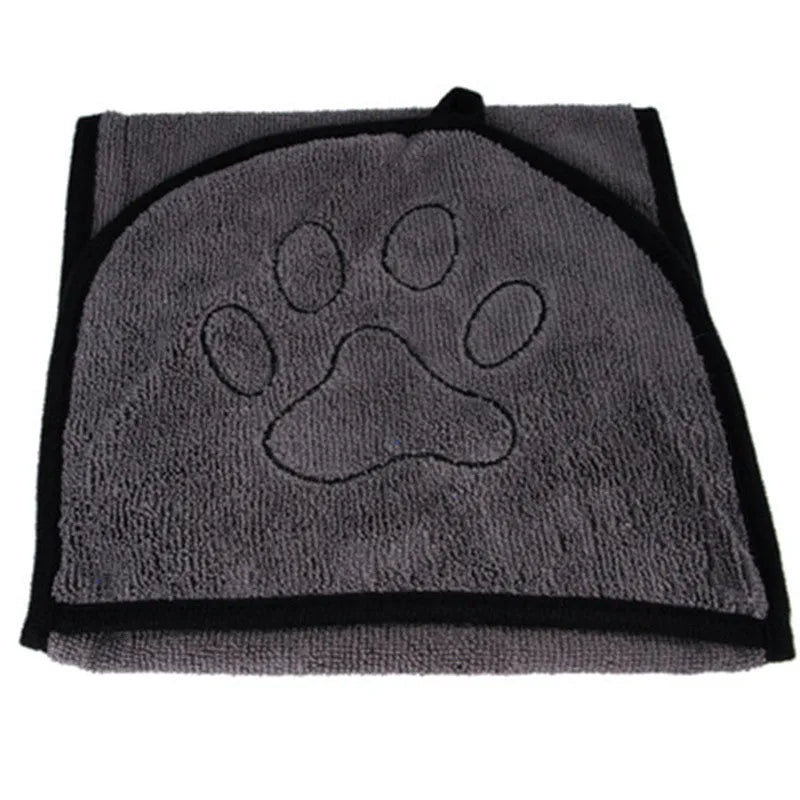 Dog bathrobe towel in blue made from absorbent fibre material for drying pets