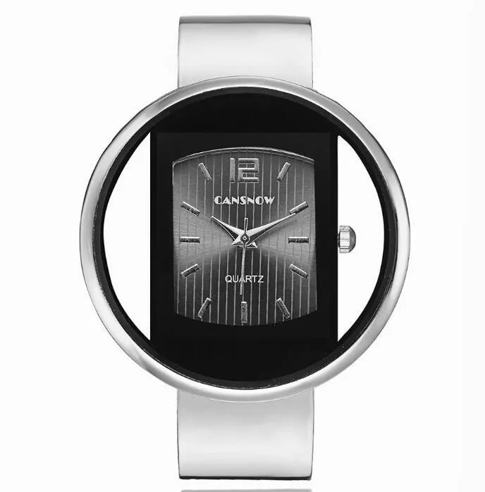 Women's adjustable cuff bracelet watch with 40mm dial, steel band, and choice of gold or silver finish