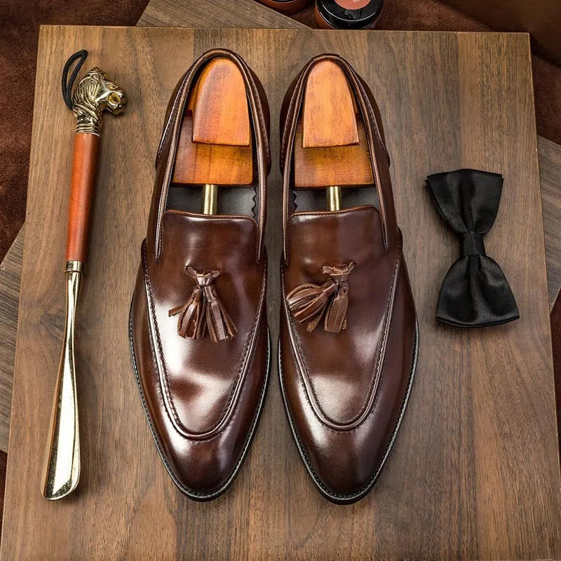 Men's black business casual tassel leather shoes with cowhide upper and low-top silhouette