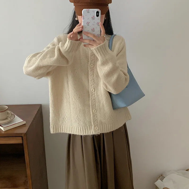 Artistic retro Korean loose fit cardigan coat in viscose fibre, shown in apricot colour.