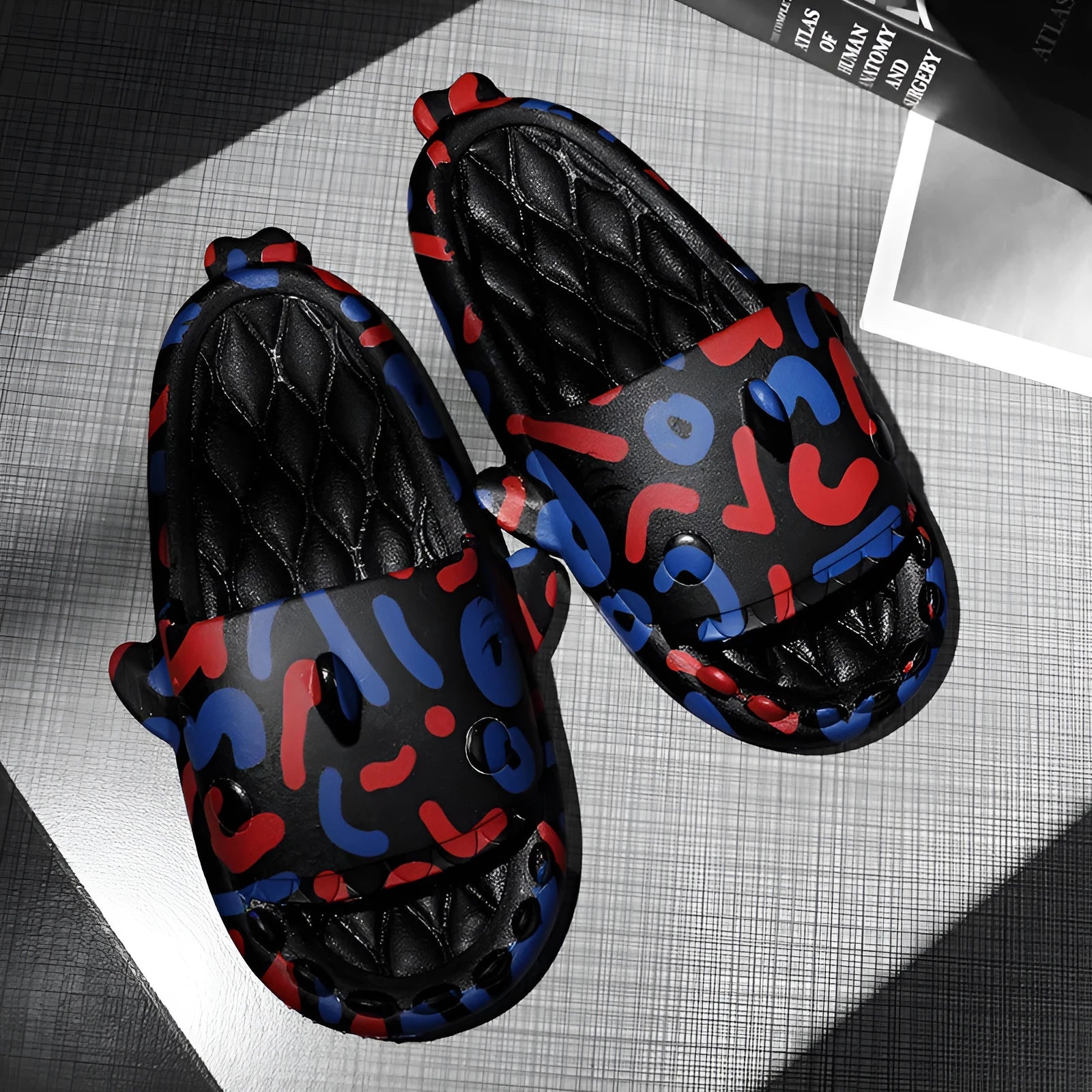 Open toe home slippers with shark design in soft EVA material, shown in multiple colour options.
