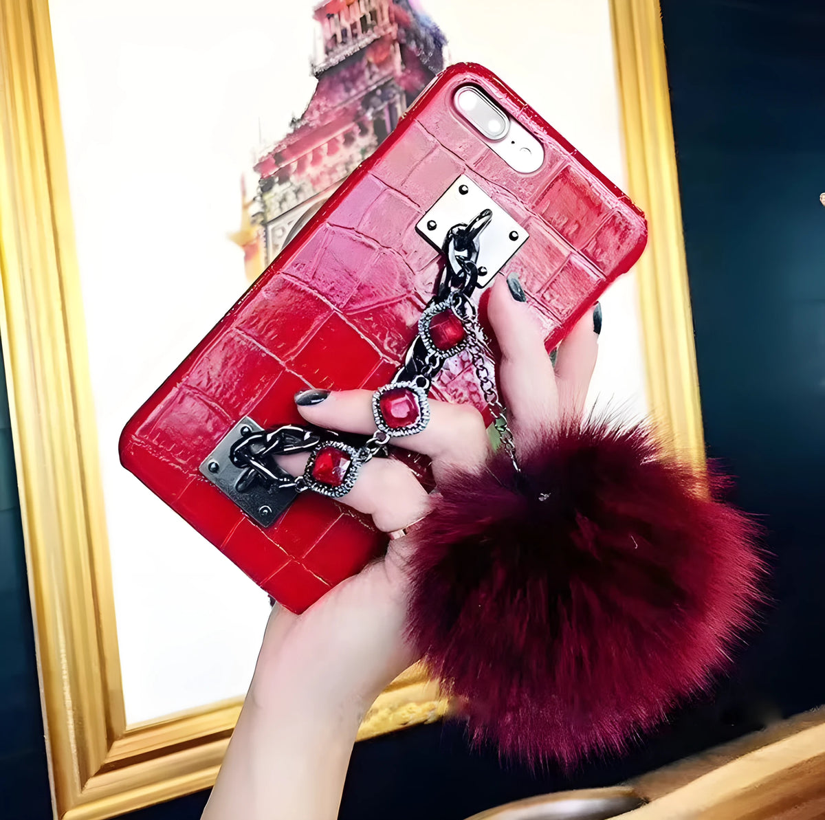 PU leather iPhone case with fox fur ball and rhinestone studs, compatible with iPhone 6, 6s, 7, 8, Plus, and X.