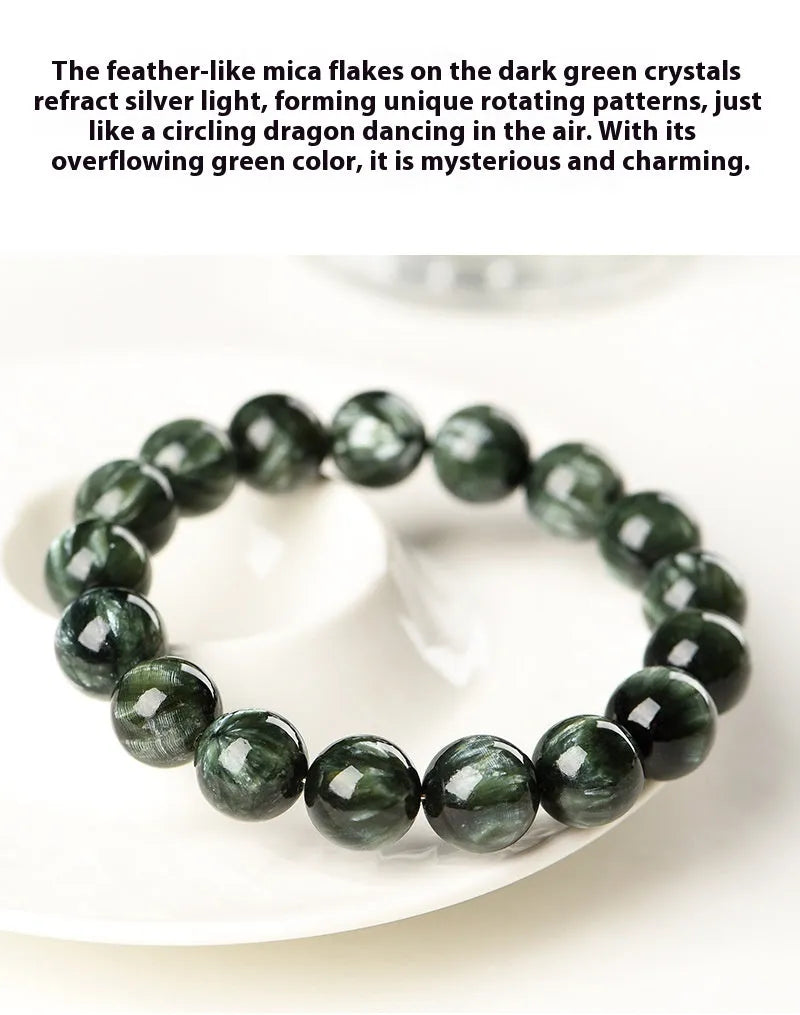 Green Dragon Crystal round bead bracelet with Ruyi design elements on a wrist.