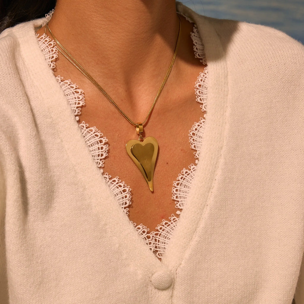 Stainless steel double heart necklace with snake chain design and geometric pendant