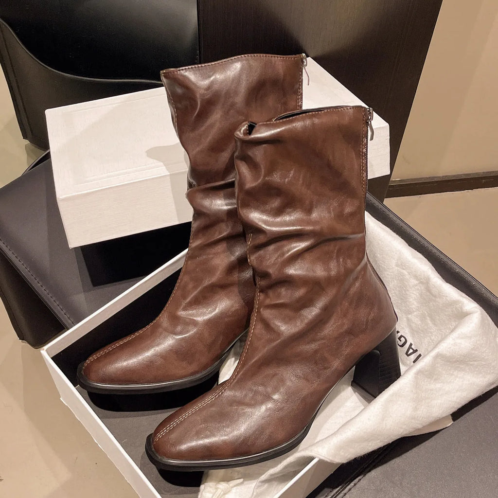 Women's wide fit high heel ankle boots with square toe, chunky heel, and back zipper in black, brown, or coffee.