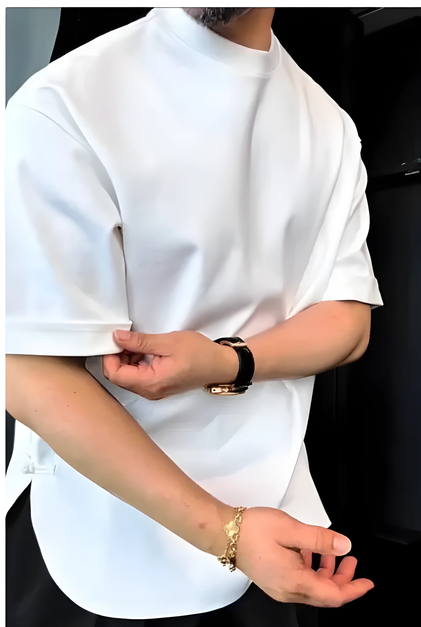 White men's T-shirt with a round hem and single button detail on a hanger