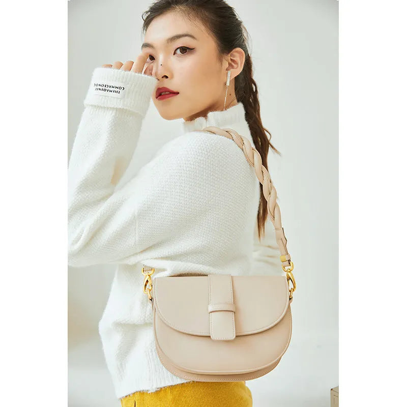 Women’s round crossbody bag in light brown with two-layer cowhide and double braid shoulder straps