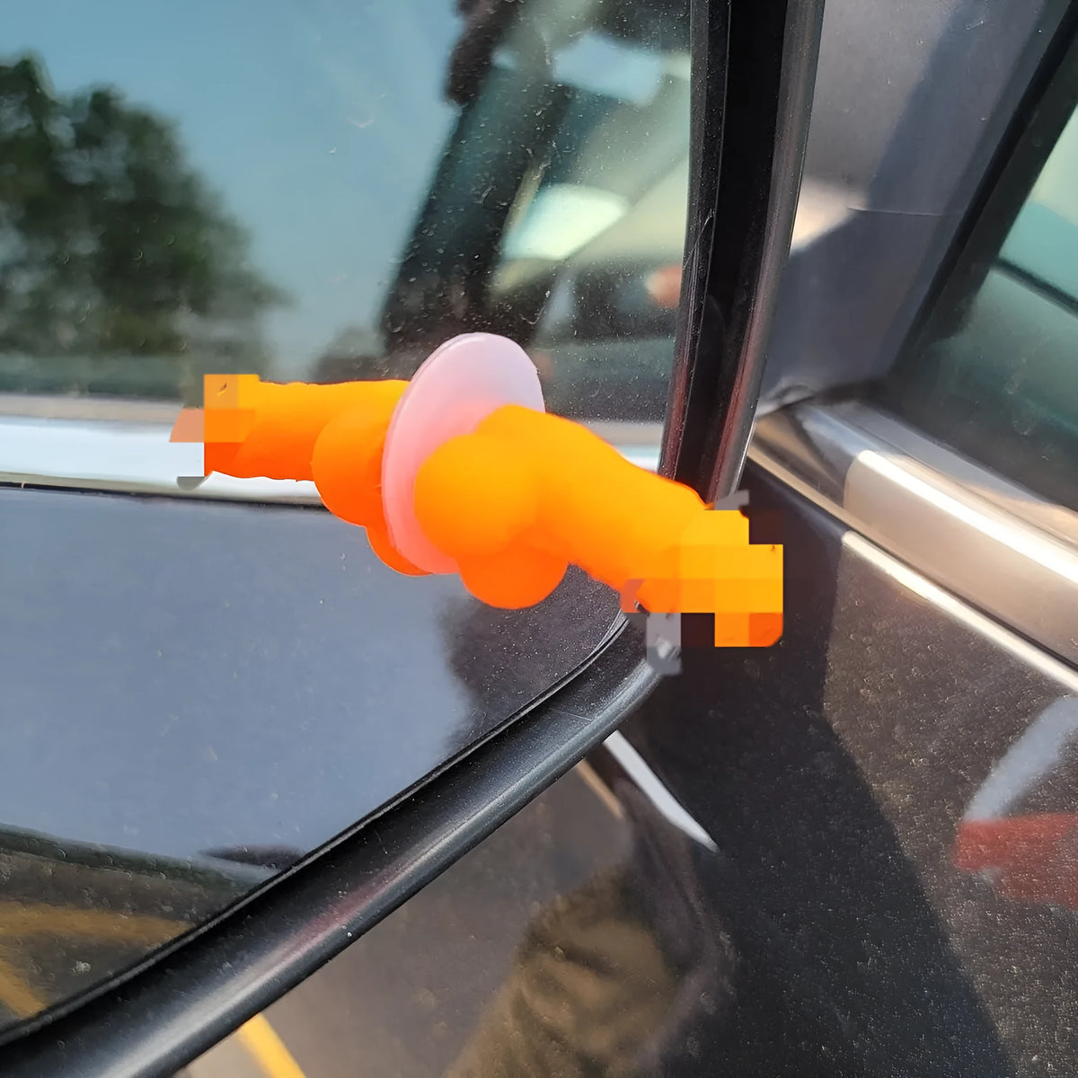 Five rubber tubeless valve caps in pink black green blue orange with modern art style