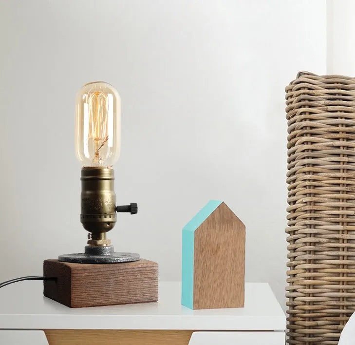 Compact industrial water pipe table lamp made of wood and iron